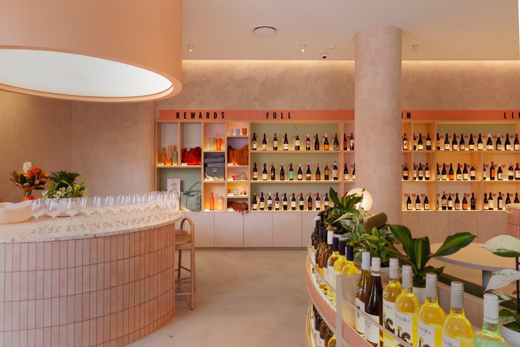 Inside the Good Pair Days Surry Hills wine bar, with bottles on the wall and seating